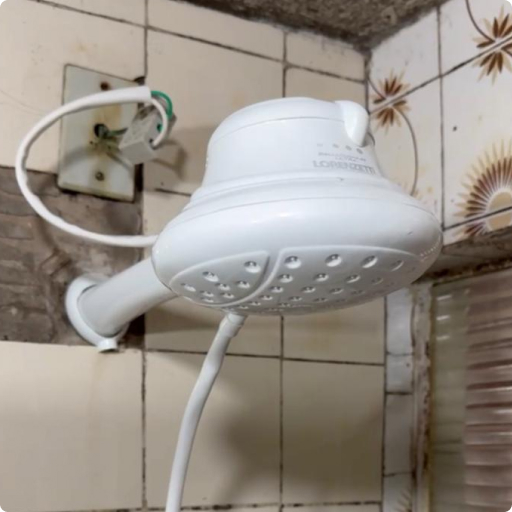 Instalação de chuveiro novo.